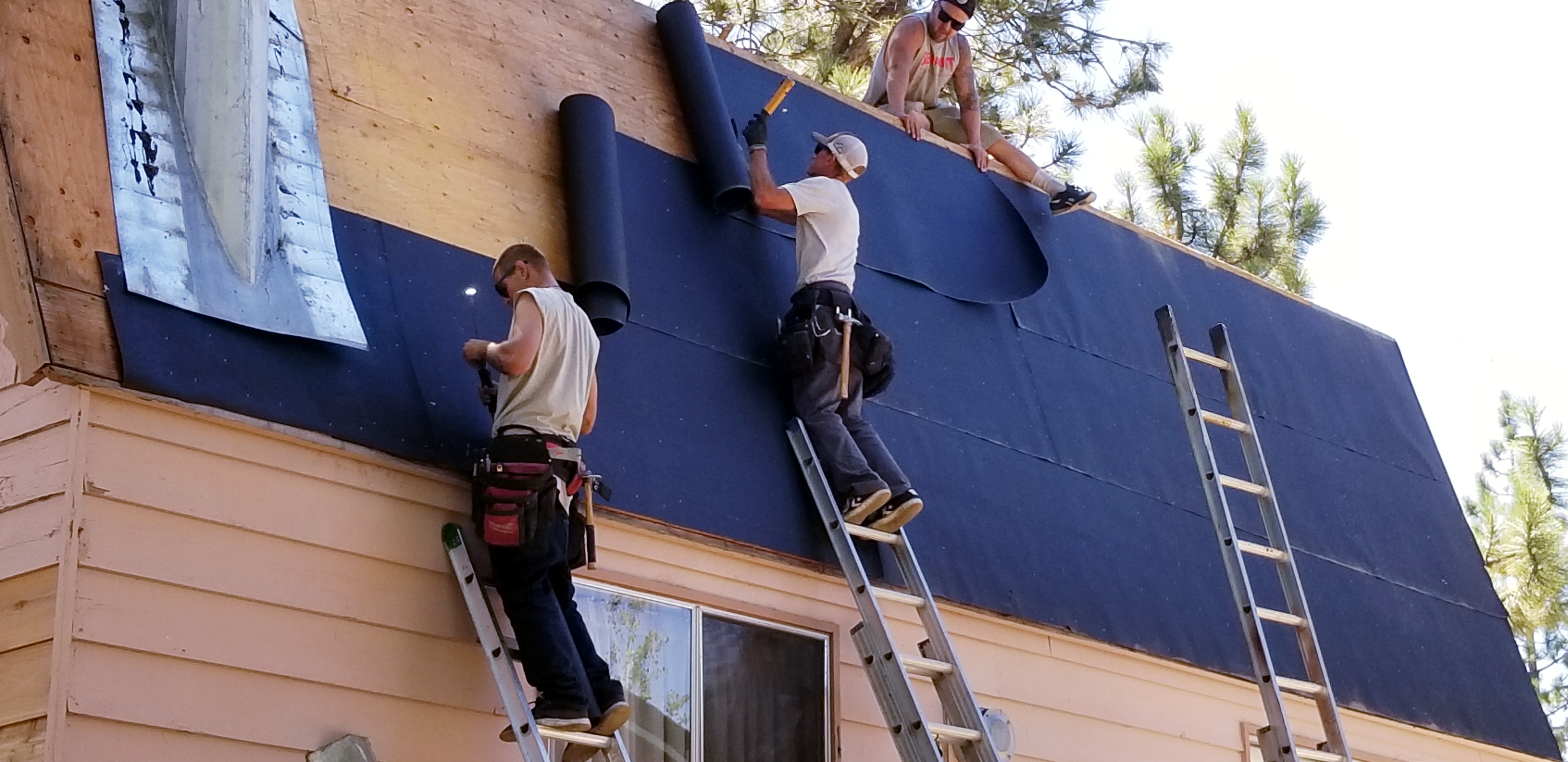 Roofers working